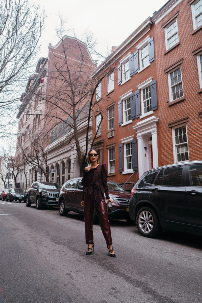 Blogger wearing colored patent leather pants.