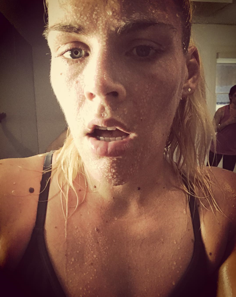 Busy Phillips sweating after a workout.