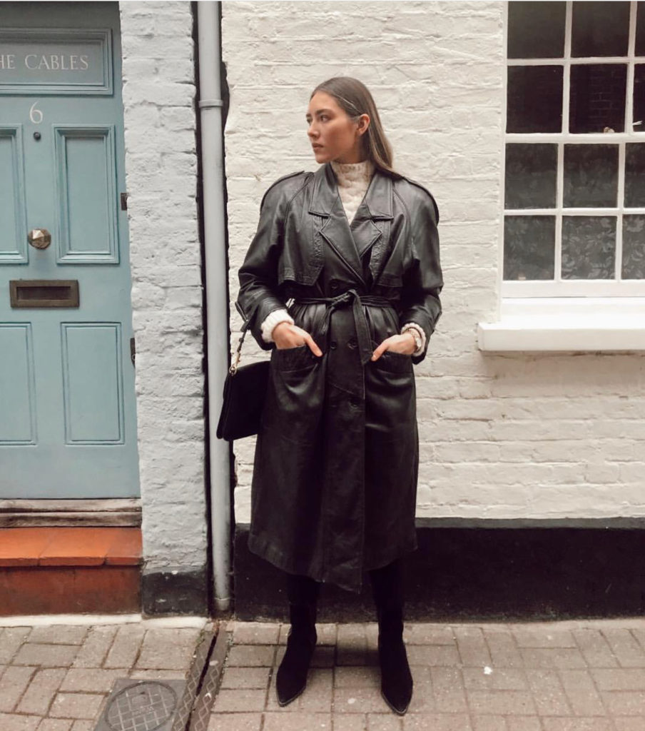 Blogger layering leather jacket under a winter coat.