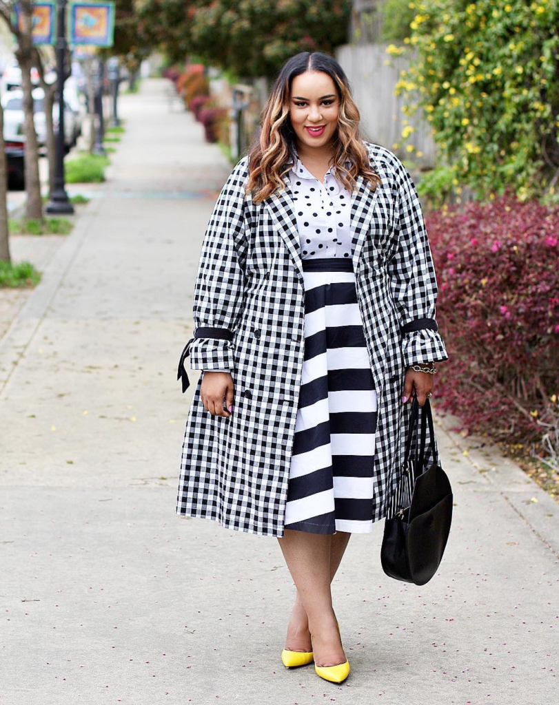 Blogger wearing black and white patterns.