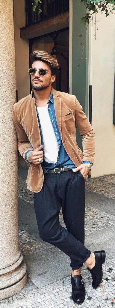Male blogger wearing several types of fabrics in one outfit.