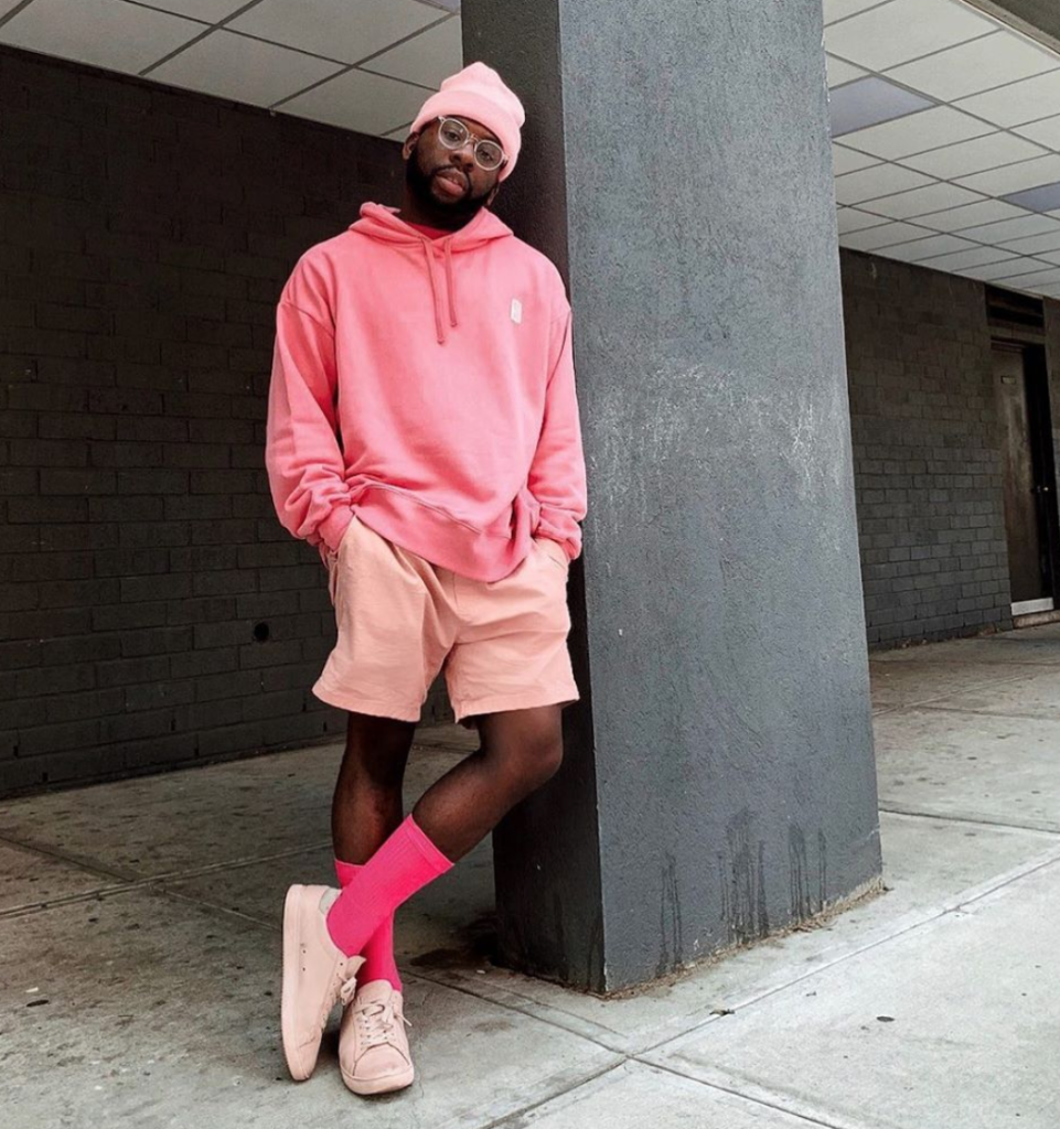 Blogger wearing several shades of pink.