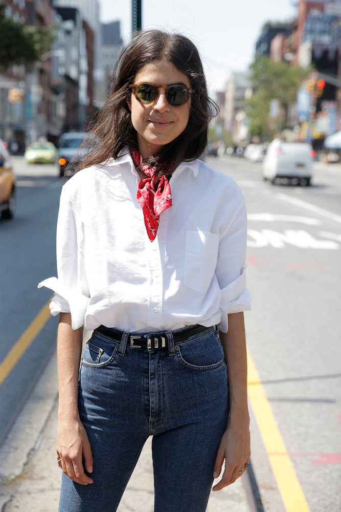 Woman wearing white button up for Labor Day ideas.