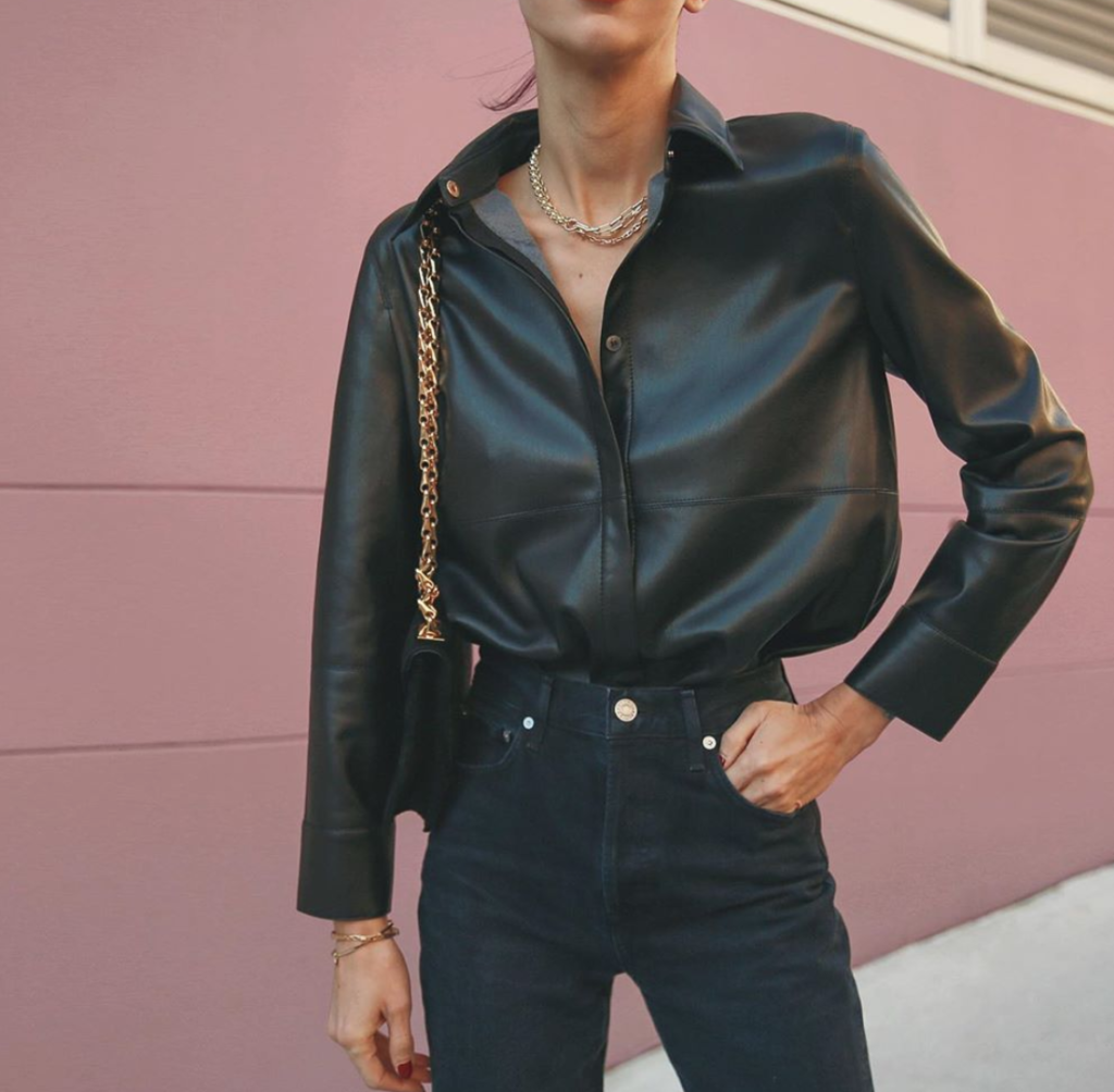 Blogger wearing black leather button-up.