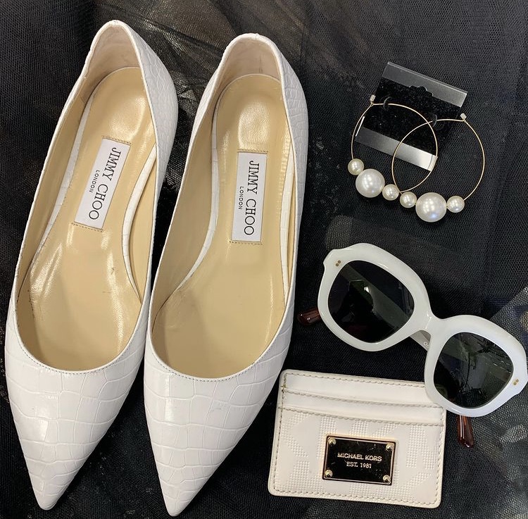 White shoes, earrings, wallet and sunglasses