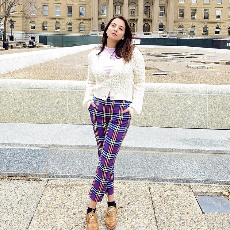Woman in pink checked pants
