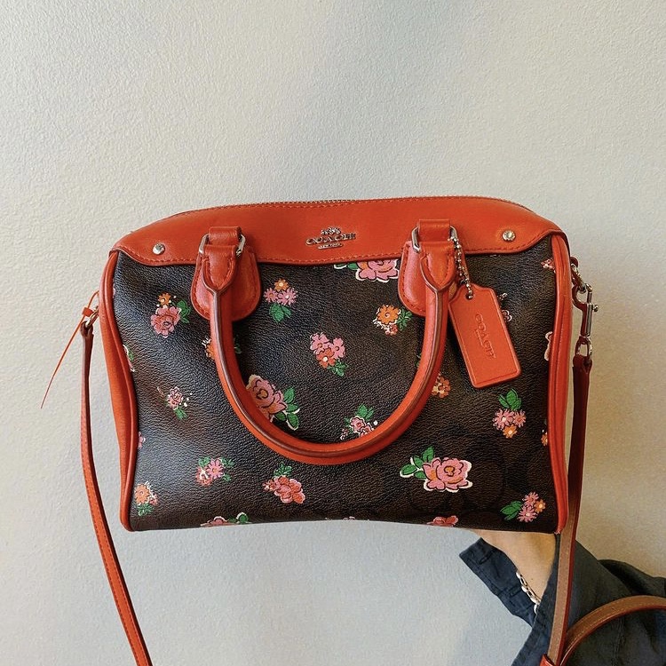 Photo of floral print Coach purse