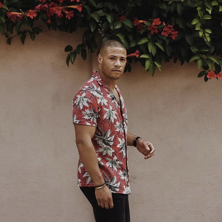 man in floral shirt