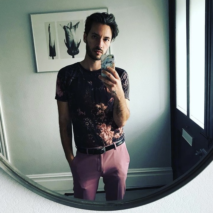 photo of man in floral t-shirt
