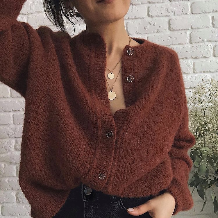 photo of brown cardigan sweater