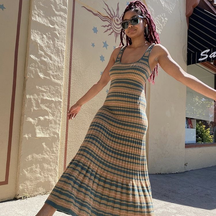 photo of woman in striped dress