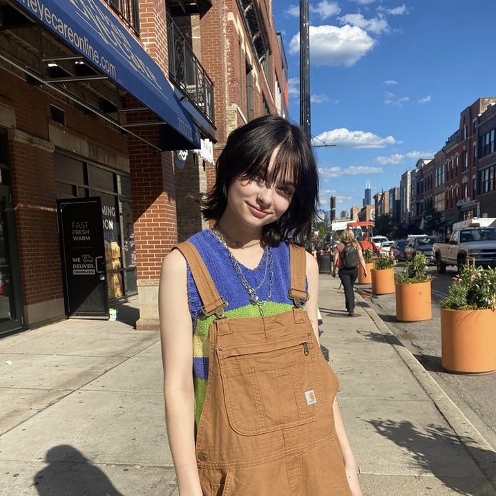 photo of woman in overalls