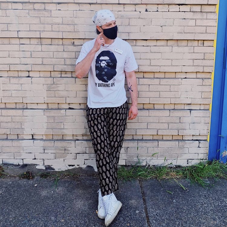 photo of man in tee and pajama pants