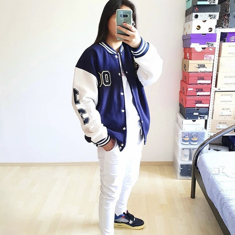 photo of person in varsity jacket