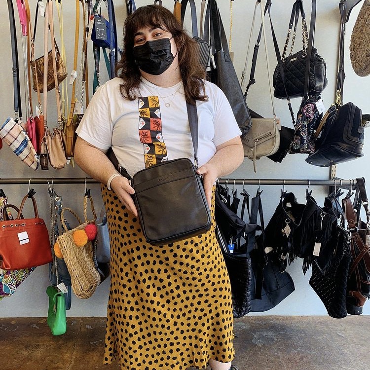 photo of person with crossbody bag