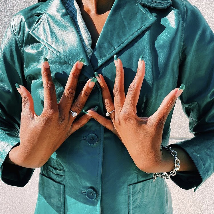 photo of teal leather coat