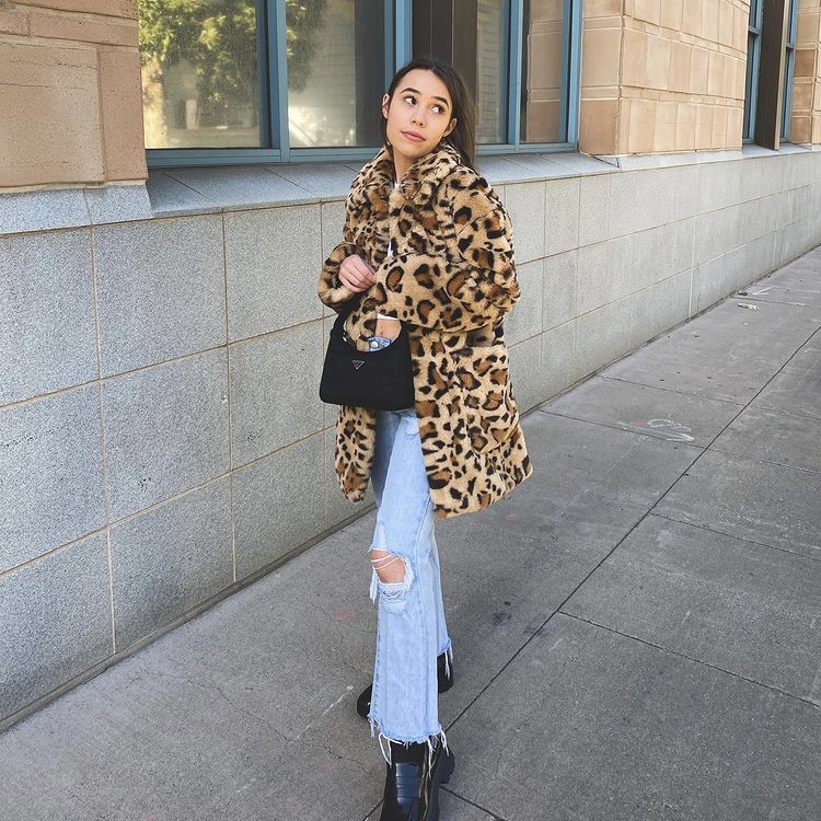 photo of person in leopard coat