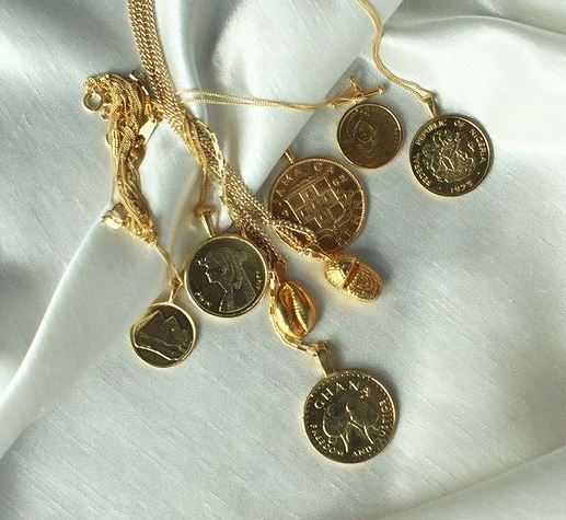 photo of gold coin necklaces