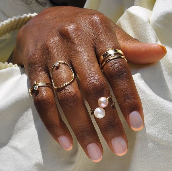 photo of hand with rings