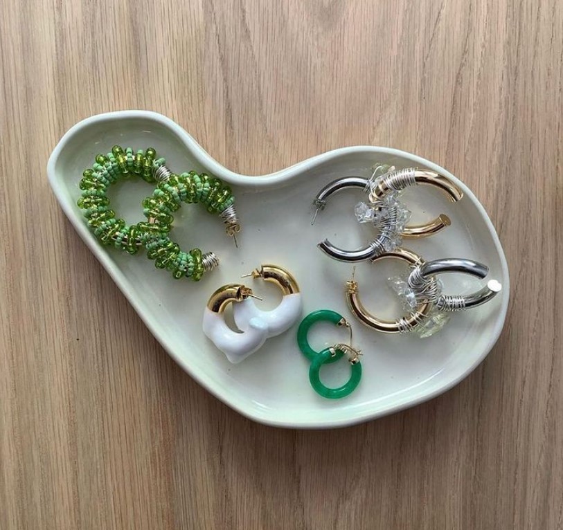 photo of a dish of earrings