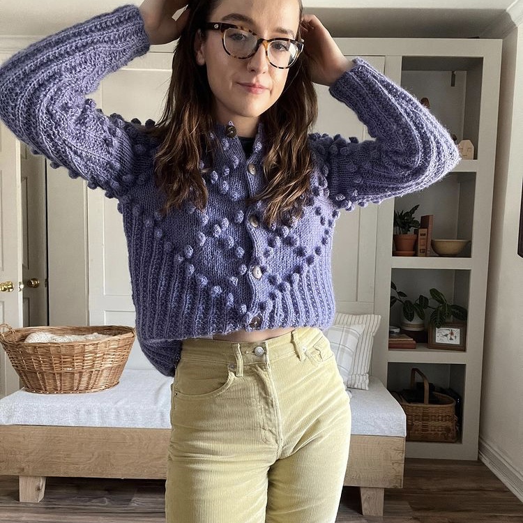 photo of person in sweater and pants