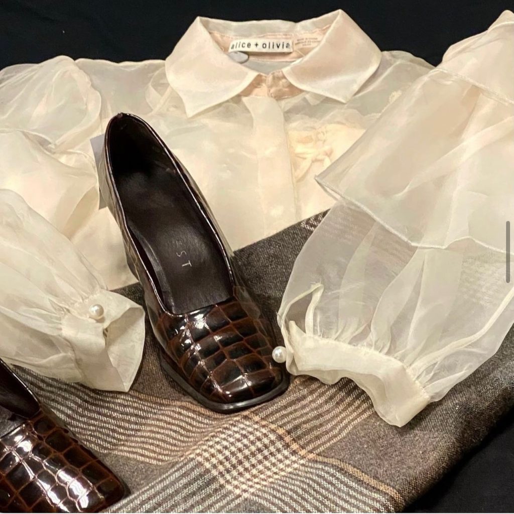 photo of blouse and loafers