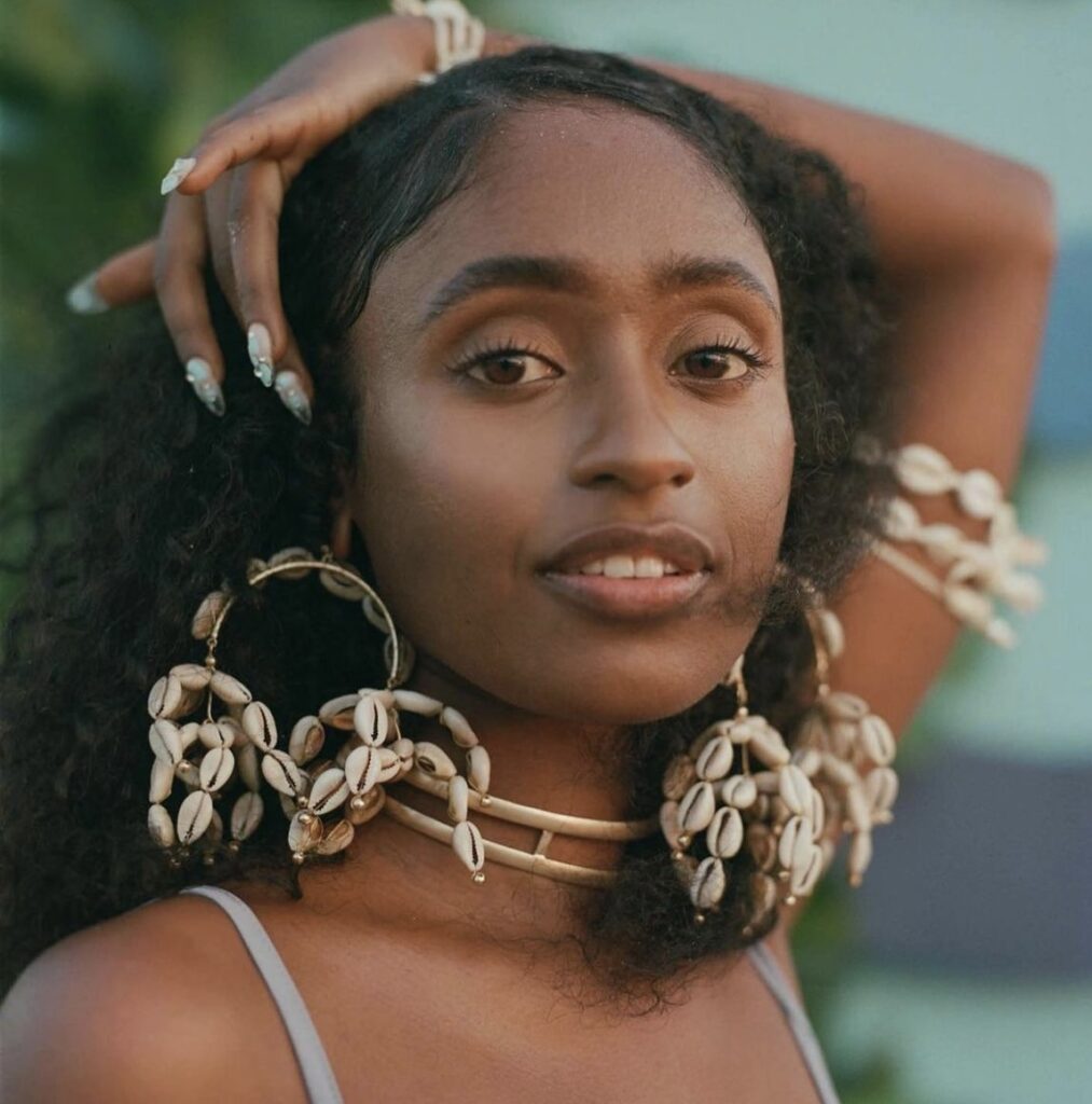 Photo of person wearing jewelry from Black-Owned Labels