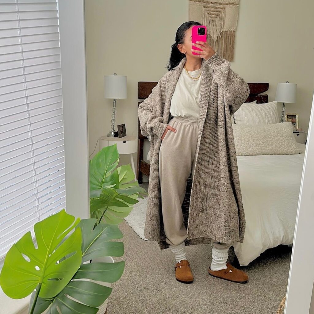 photo of a person wearing an oversized cardigan