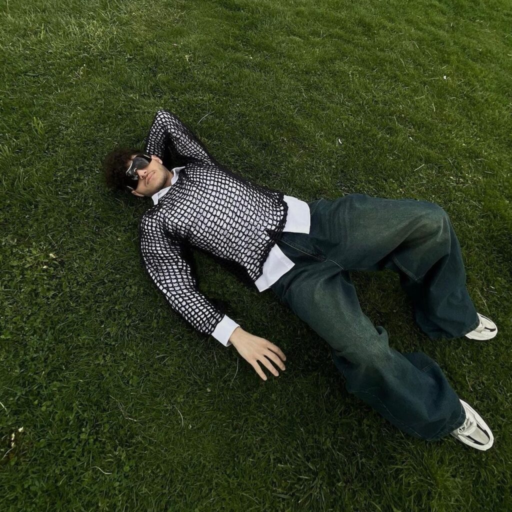 photo of a person lying in grass