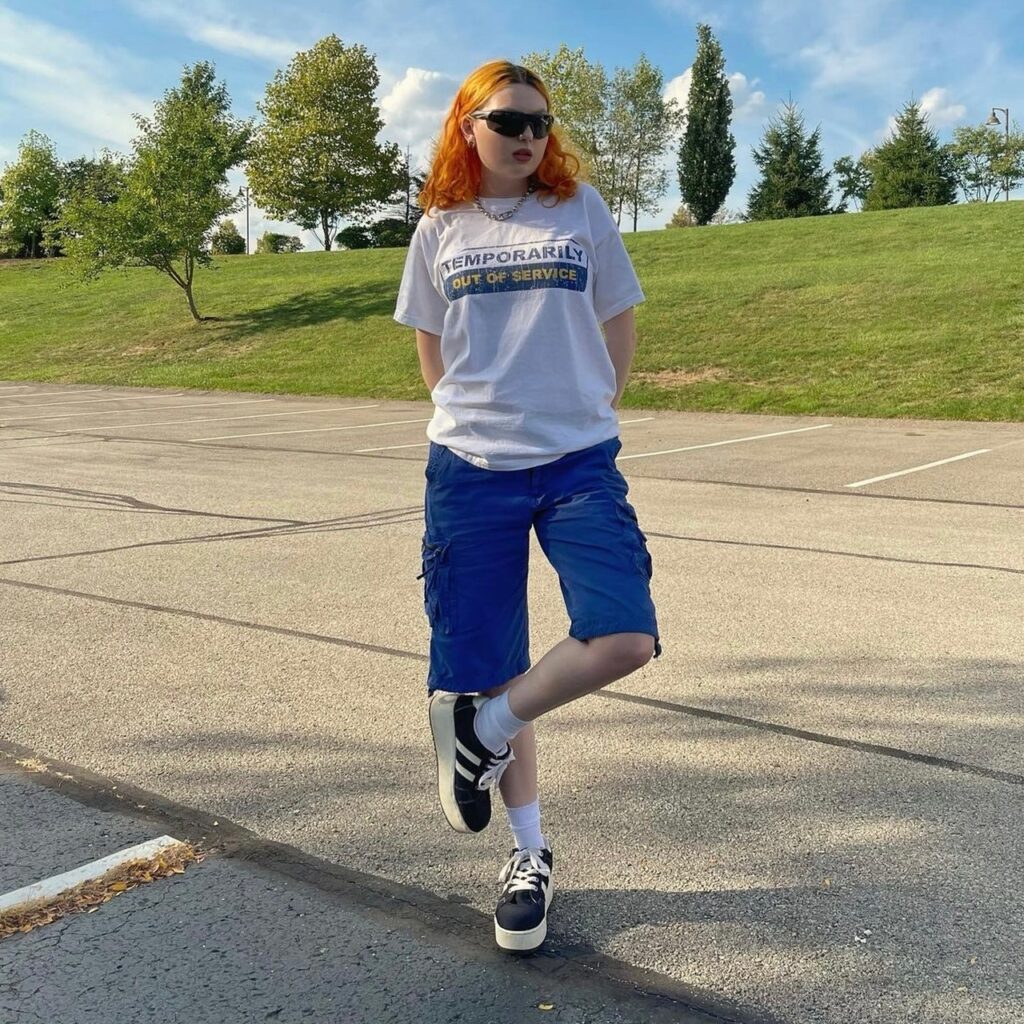 photo of person wearing long shorts