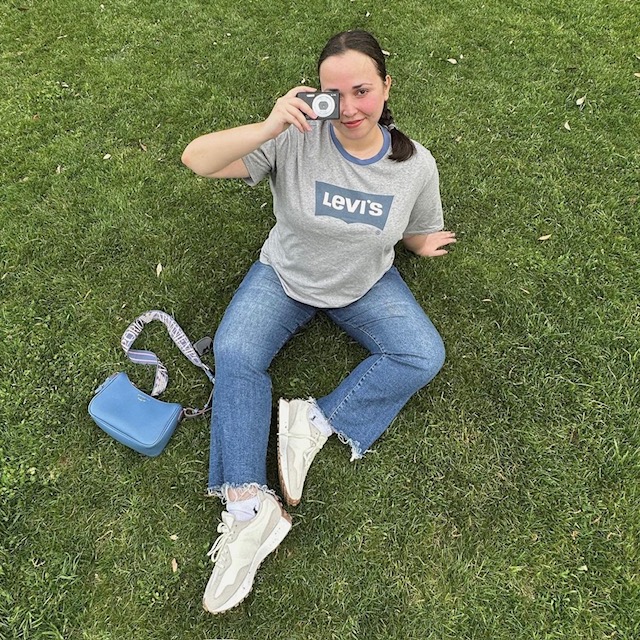 photo of person in jeans and tee