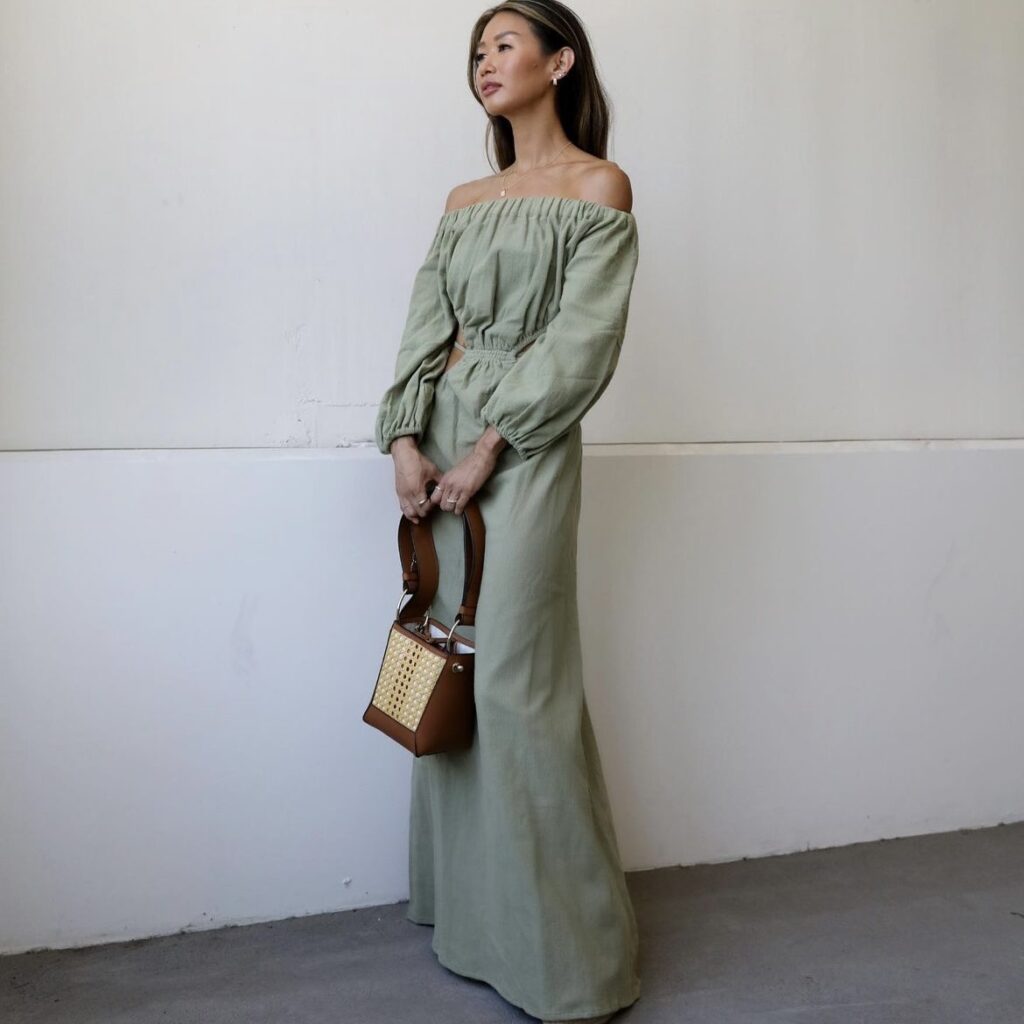 photo of person in a long light green dress 