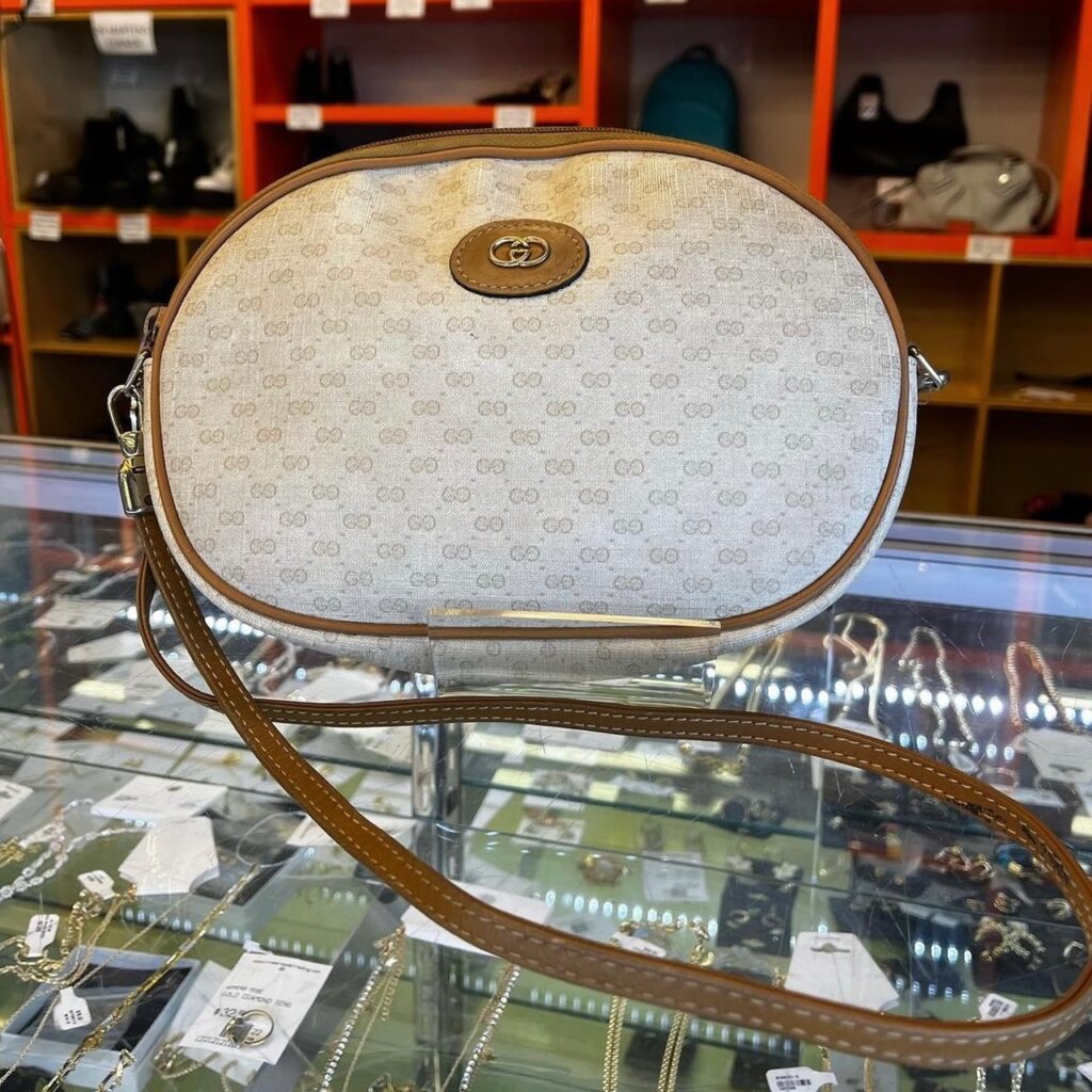 cream vintage shoulder bag with brown leather trim