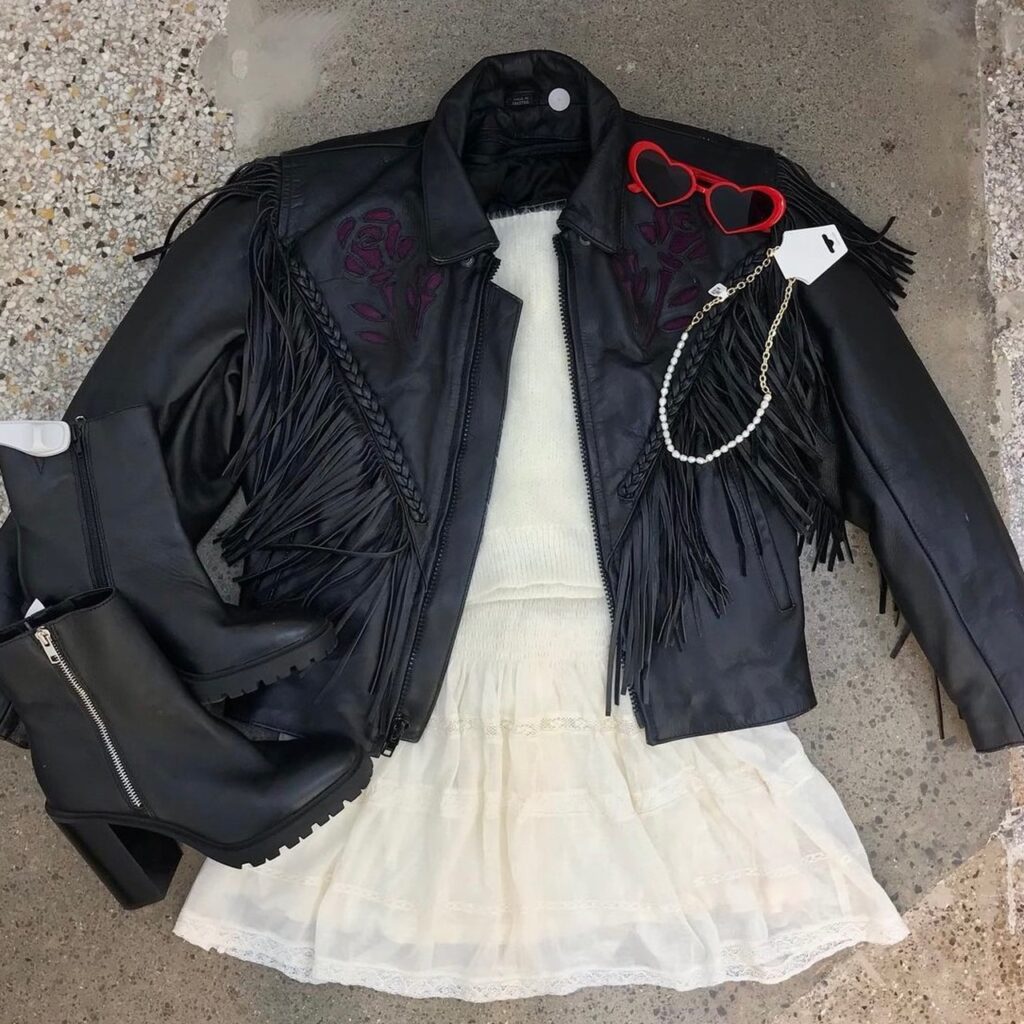 photo of black leather fringe jacket found while shopping secondhand shops