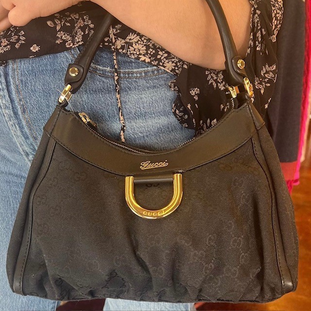 An example of our resale designer bags, a black Gucci handbag