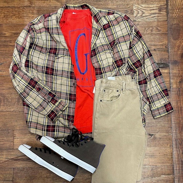 men's clothing resale items: khakis, plaid flannel shirt, and red t-shirt