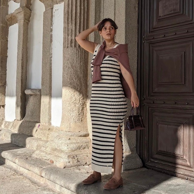 woman in long striped ribbed summer dress