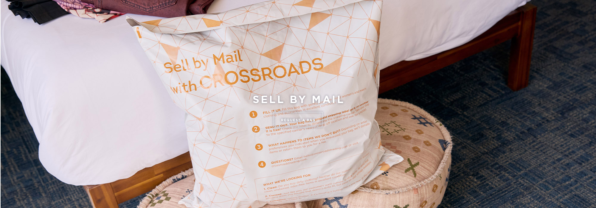 Crossroads sell by mail white plastic bag photo text reads sell by mail request a bag
