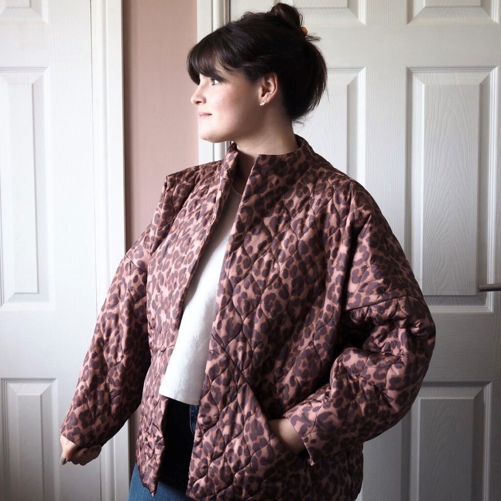 woman in leopard-print quilted jacket