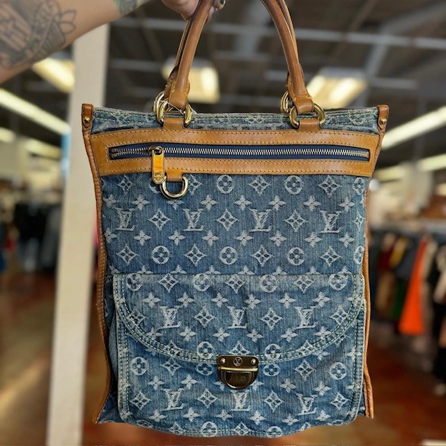 Louis Vuitton oversized handbag in logoed blue denim with brown leather trim 