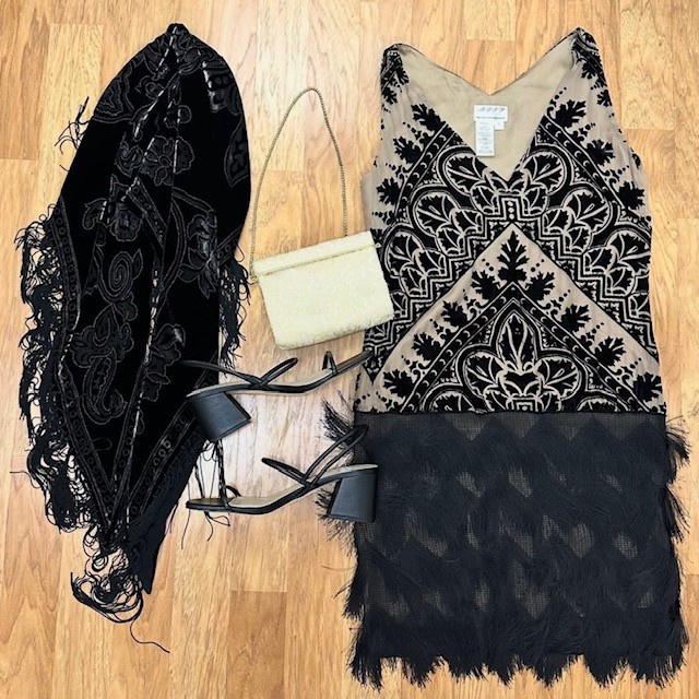 flatlay of a flapper outfit