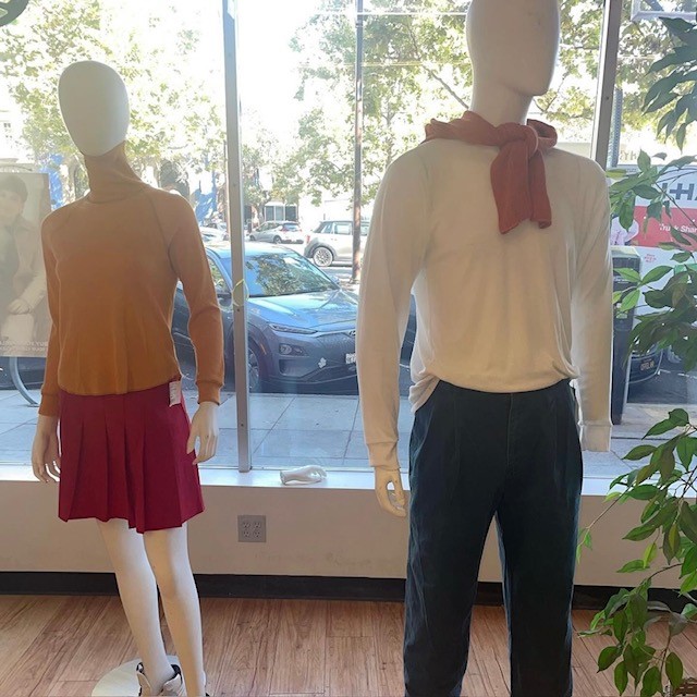 two mannequins with each wearing a Halloween costume from the Scooby-Doo crew