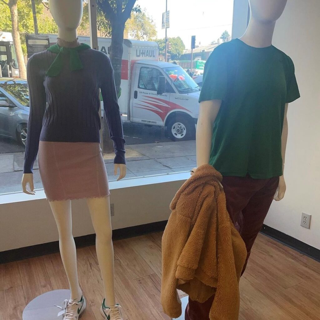 two mannequins with each wearing a Halloween costume from the Scooby-Doo crew