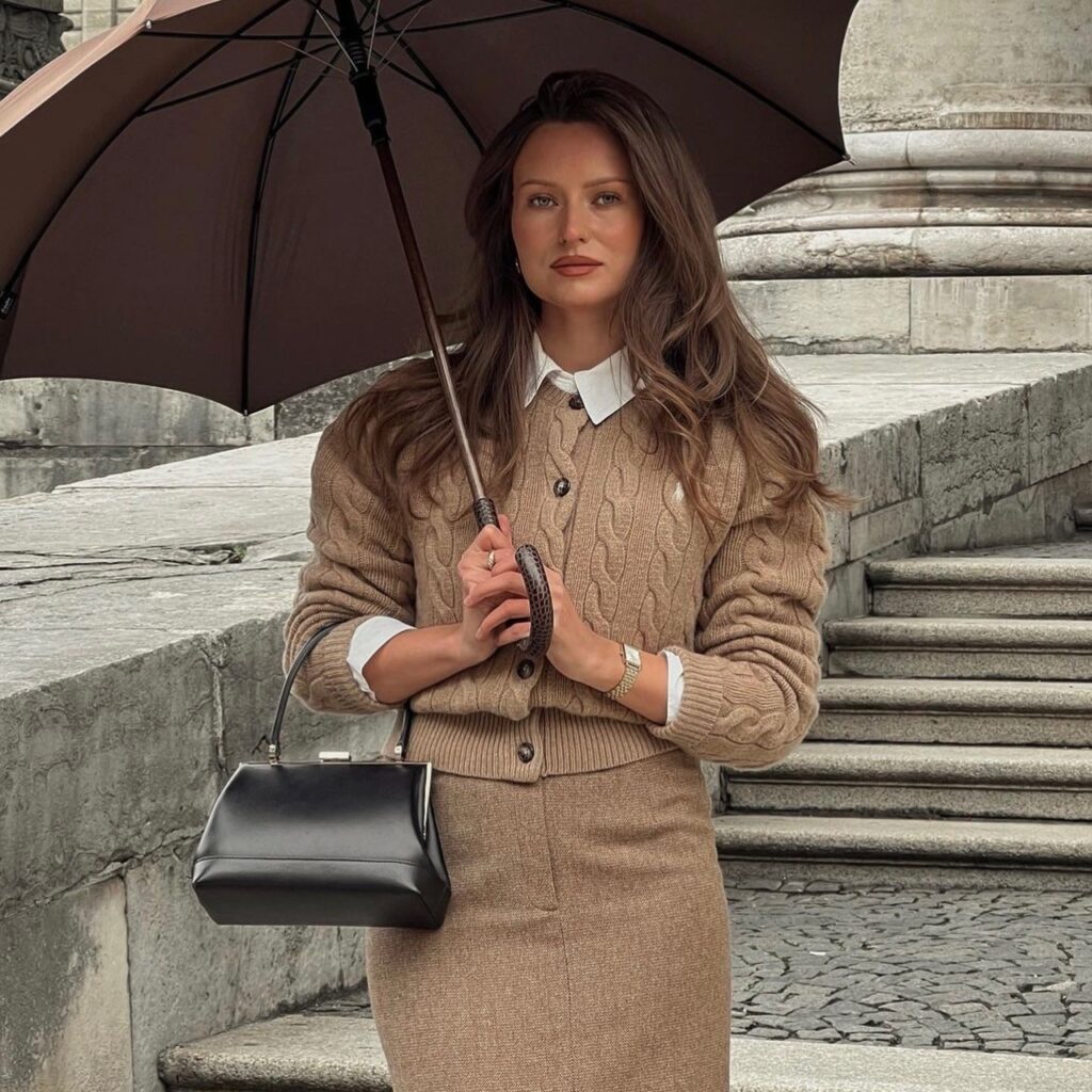 woman wearing a beige cardigan and pencil skirt