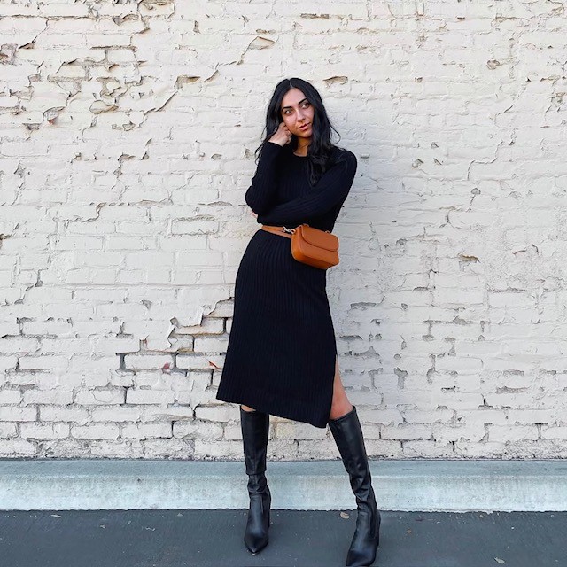 woman with long black dress and black tall boots