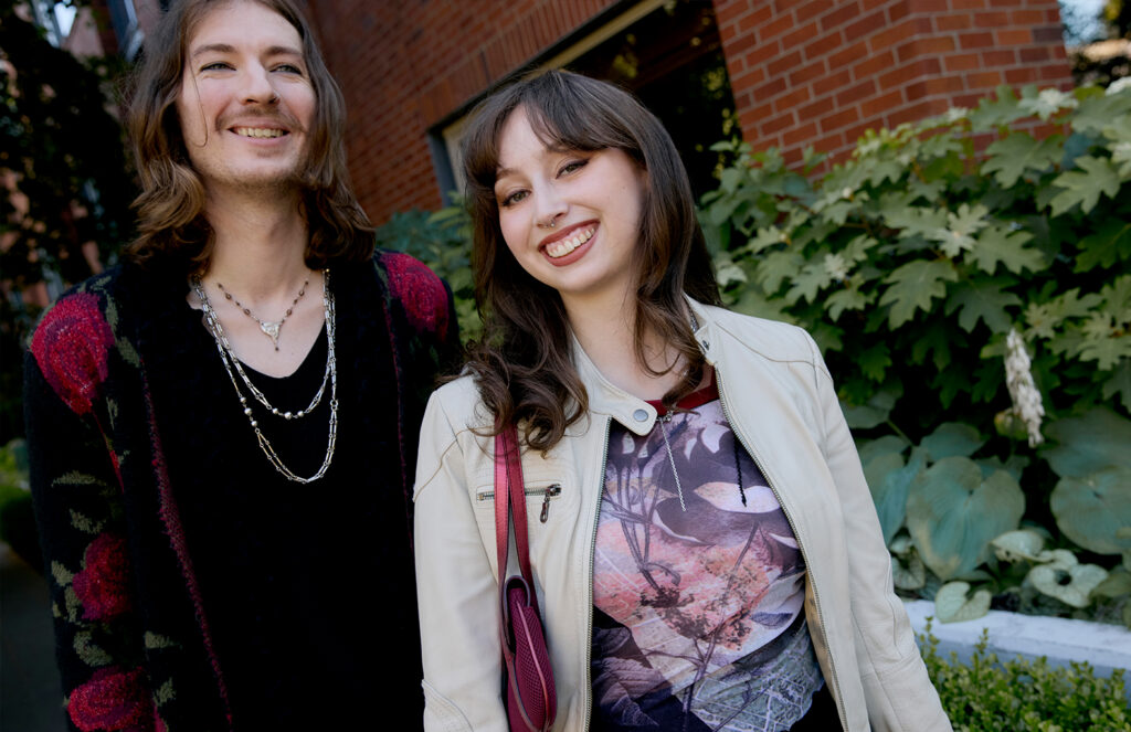 Claire and Aleks posed for the camera wearing winter fashion