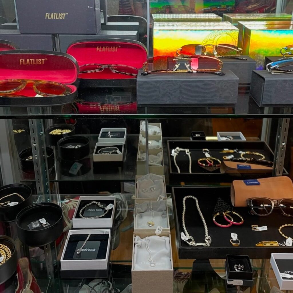 shelves of sunglasses and jewelry