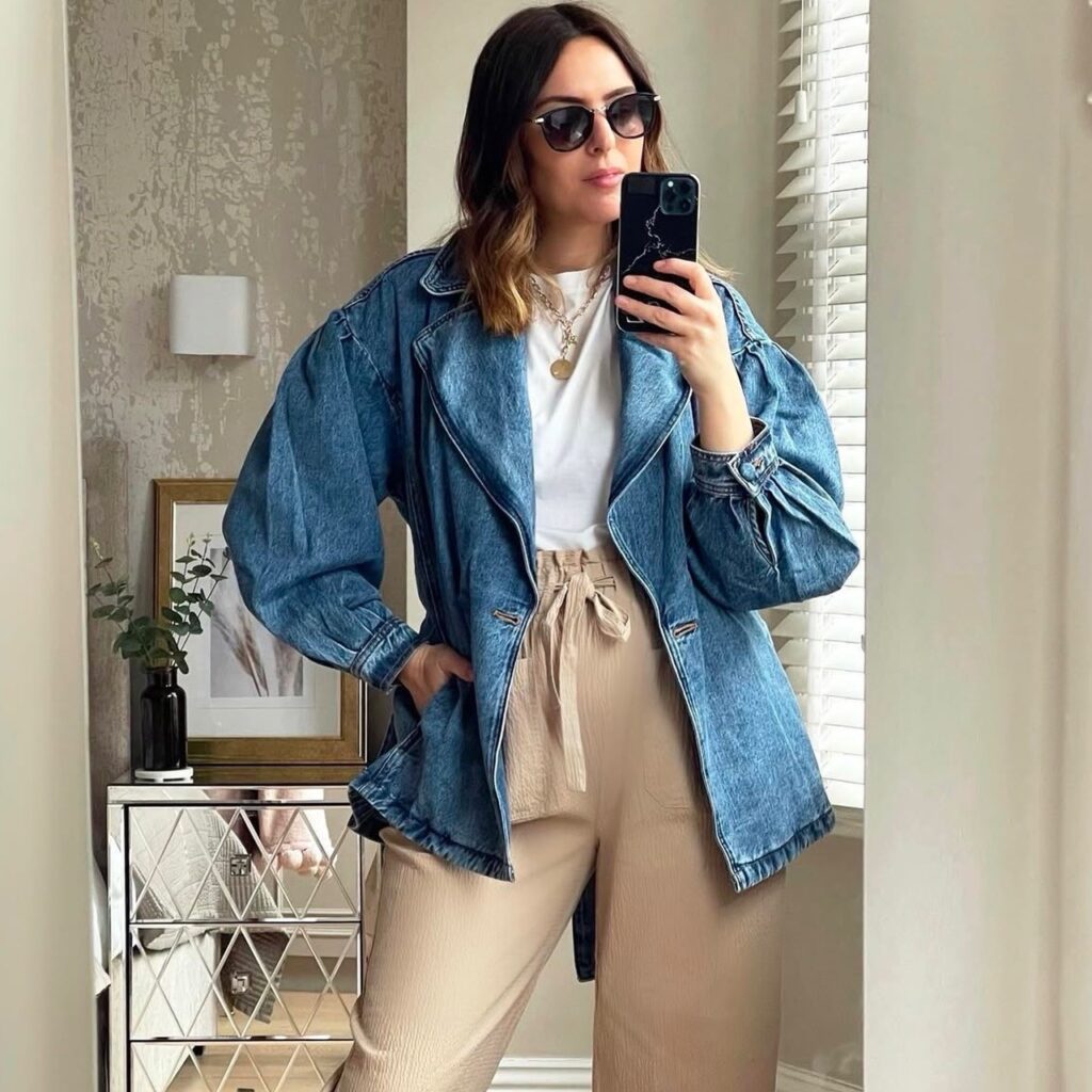 woman in style with puff sleeves with white tee and tan pants