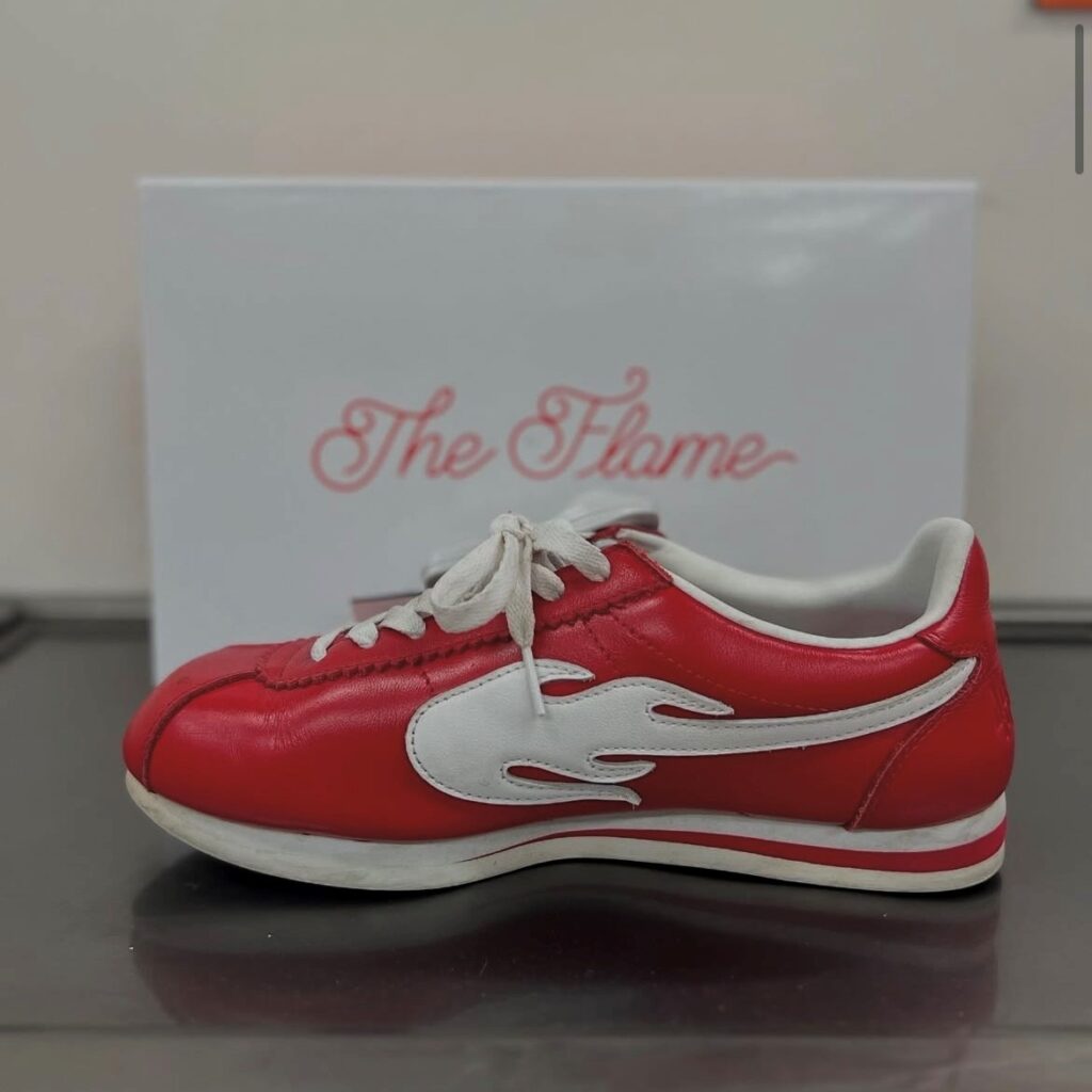a thrifted red sneaker