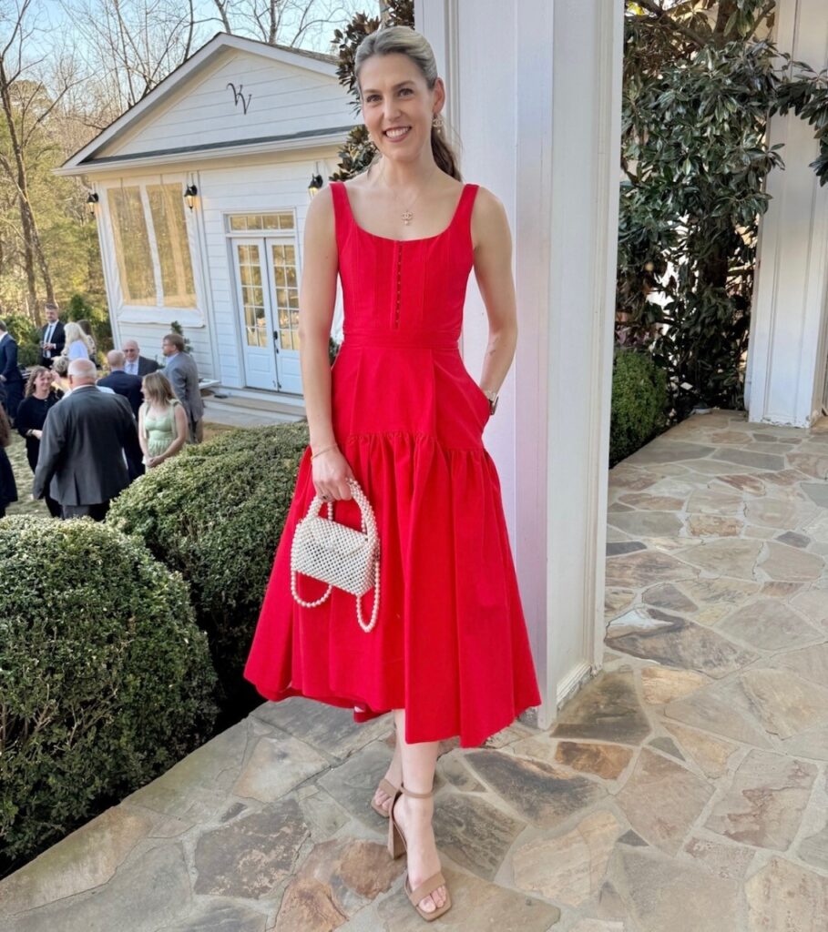 woman in a red maxi dress